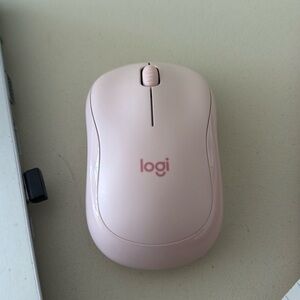 Pink wireless Logitech mouse
